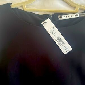 Alice & Olivia black dress with white stripes down the side. New with tags